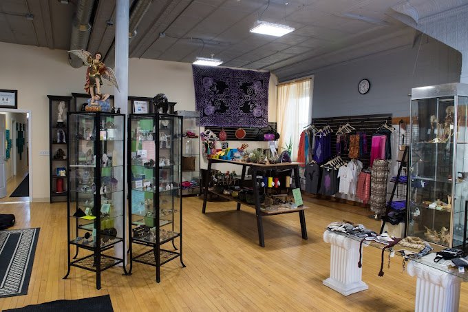 Organized crystal display with labeled stones and healing minerals