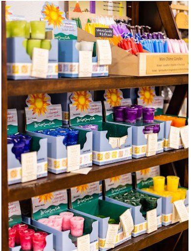 Variety of gemstones, crystal carvings, and polished mineral specimens