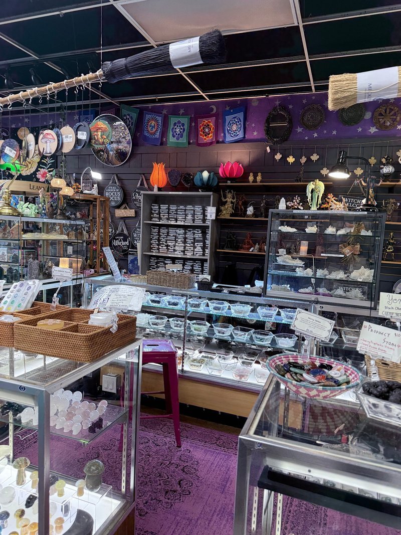 Crystal and mineral specimens including quartz, amethyst, and calcite varieties