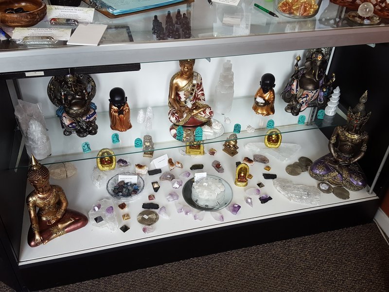 Interior view showcasing crystal towers, spheres, and carved stone pieces