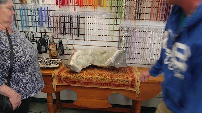 Crystal and mineral specimens including quartz, amethyst, and calcite varieties