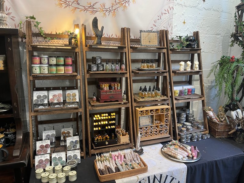 Shop interior featuring gemstones, healing crystals, and spiritual products