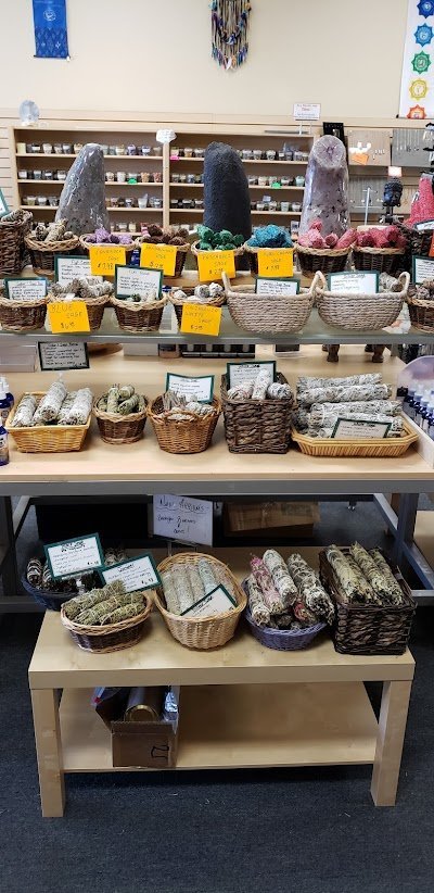 Selection of healing crystals, tumbled stones, and decorative mineral pieces