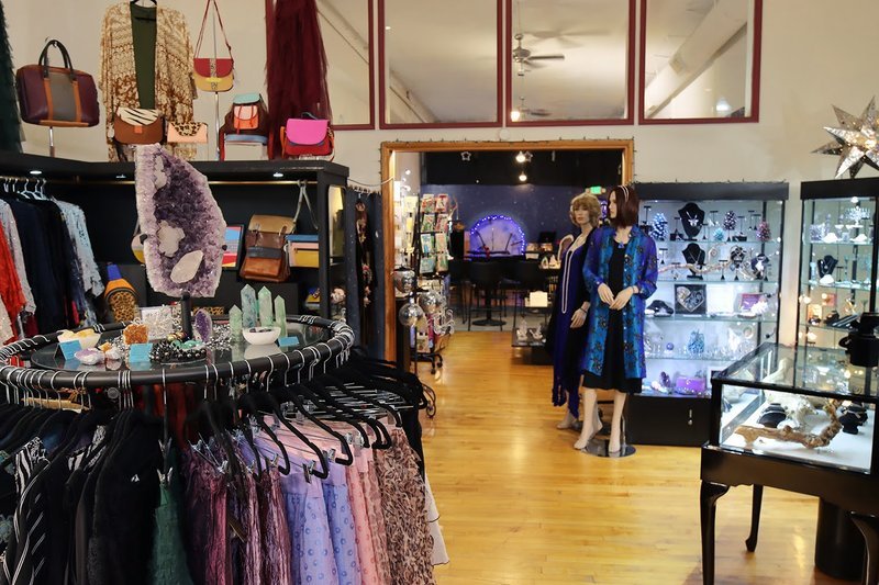 Retail display with tumbled stones, raw crystals, and polished specimens