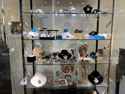 Selection of healing crystals, tumbled stones, and decorative mineral pieces