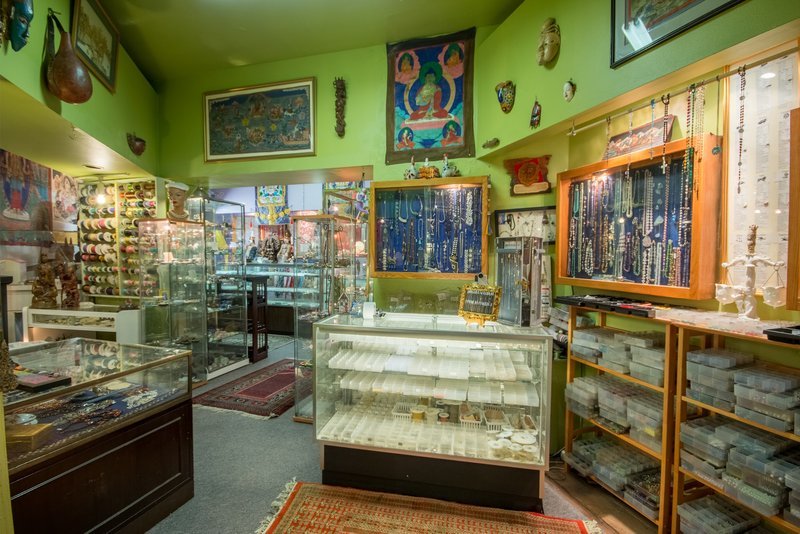 Shop interior featuring gemstones, healing crystals, and spiritual products