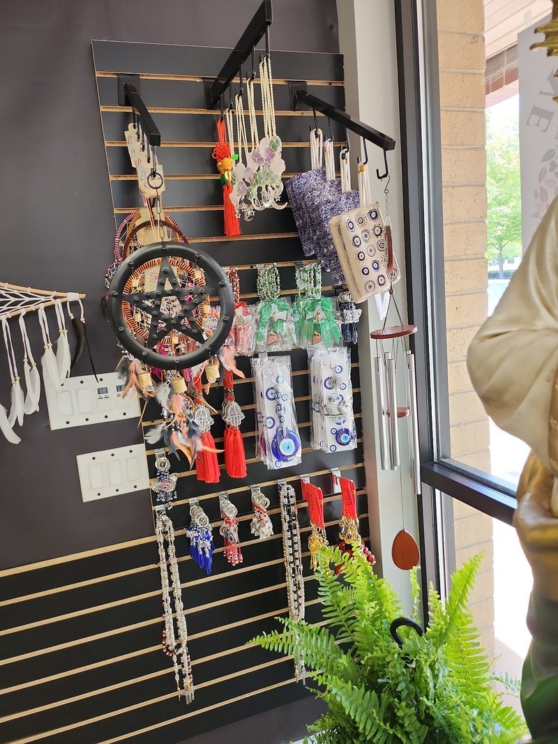 Interior view showcasing crystal towers, spheres, and carved stone pieces