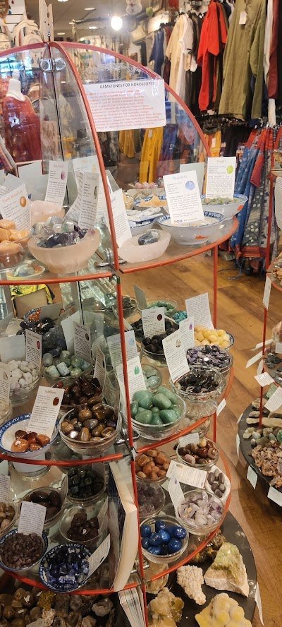 Shop interior featuring gemstones, healing crystals, and spiritual products