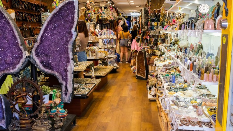 Organized crystal display with labeled stones and healing minerals