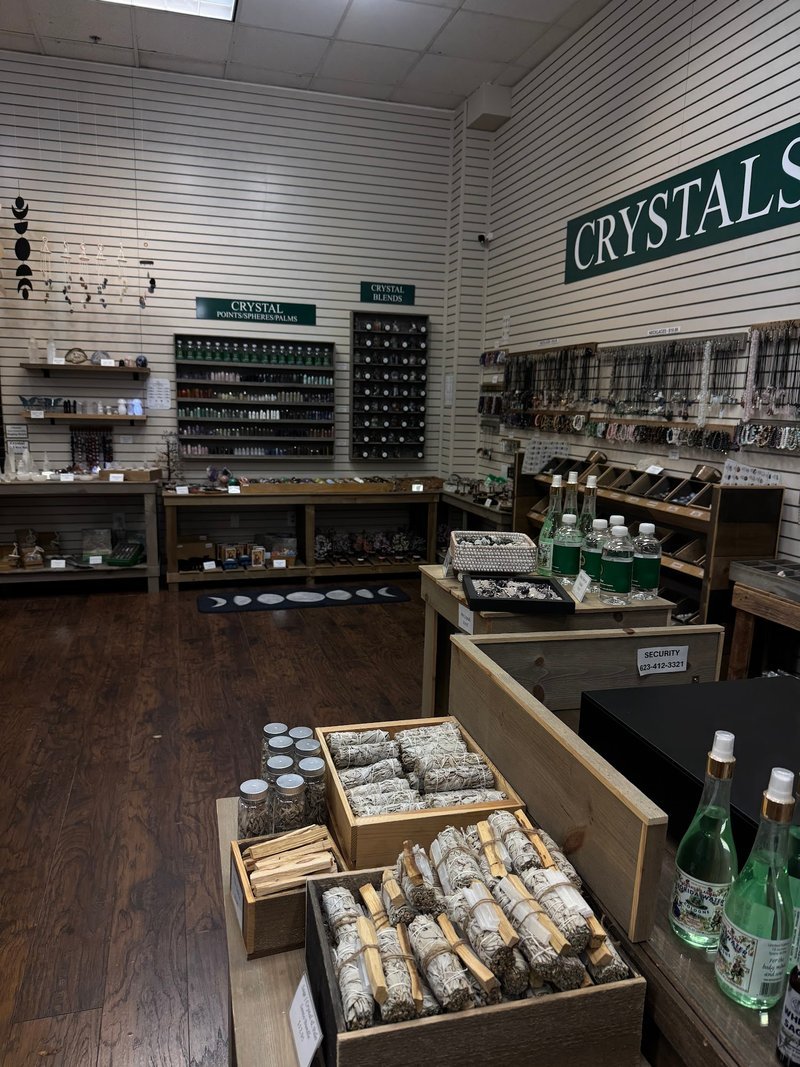 Retail display with tumbled stones, raw crystals, and polished specimens