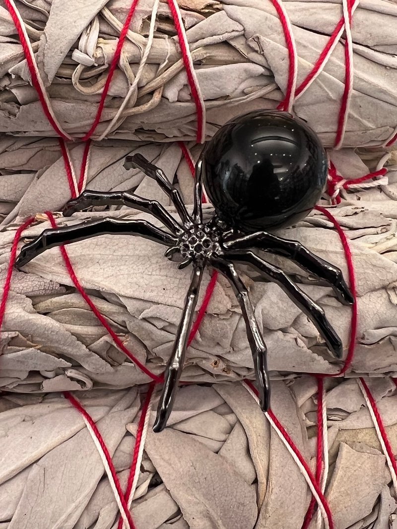 Display featuring crystal points, polished stones, and raw mineral specimens