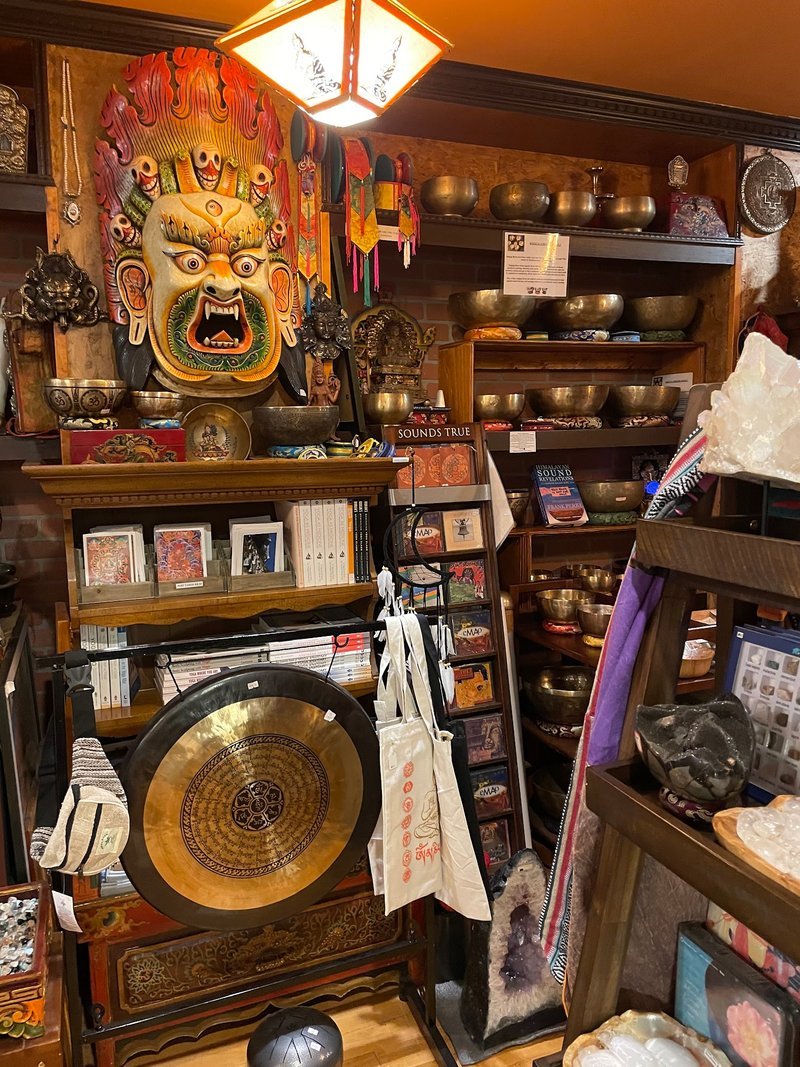 Organized crystal display with labeled stones and healing minerals
