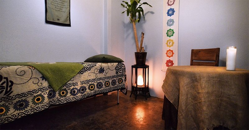 Retail shelving with organized crystals, stones, and spiritual products