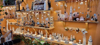 Display of polished crystal specimens, geodes, and mineral towers