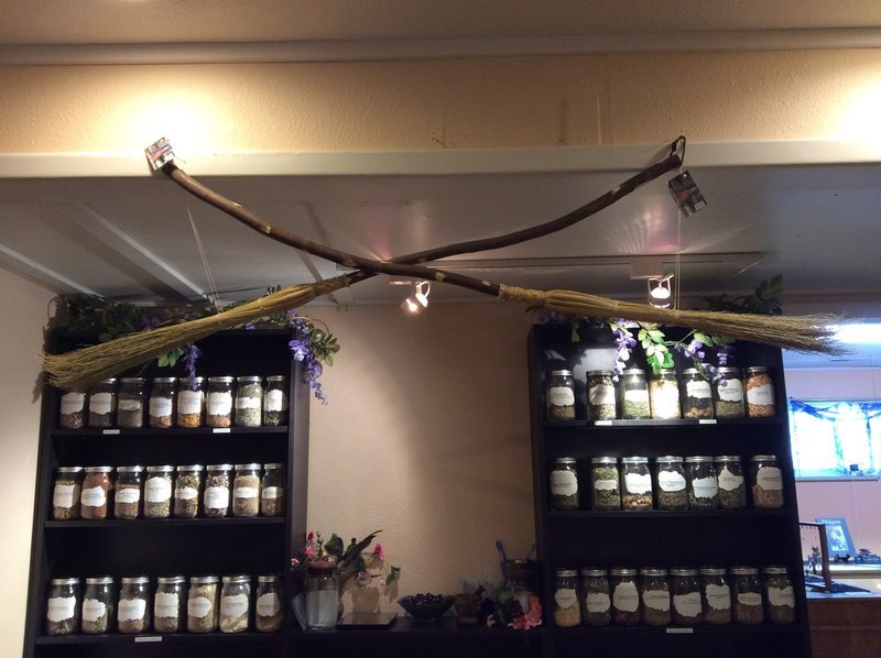 Variety of gemstones, crystal carvings, and polished mineral specimens