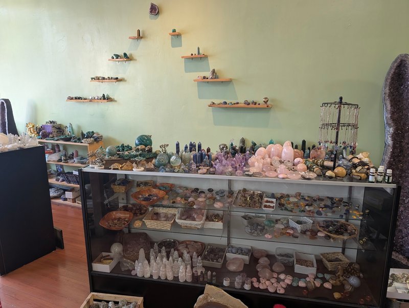 Interior view showcasing crystal towers, spheres, and carved stone pieces