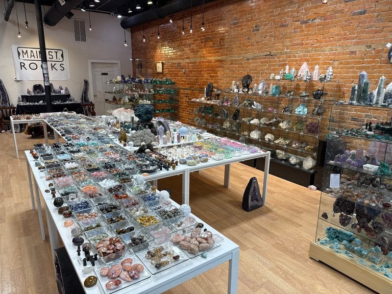 Crystal and mineral display with organized specimens and inventory