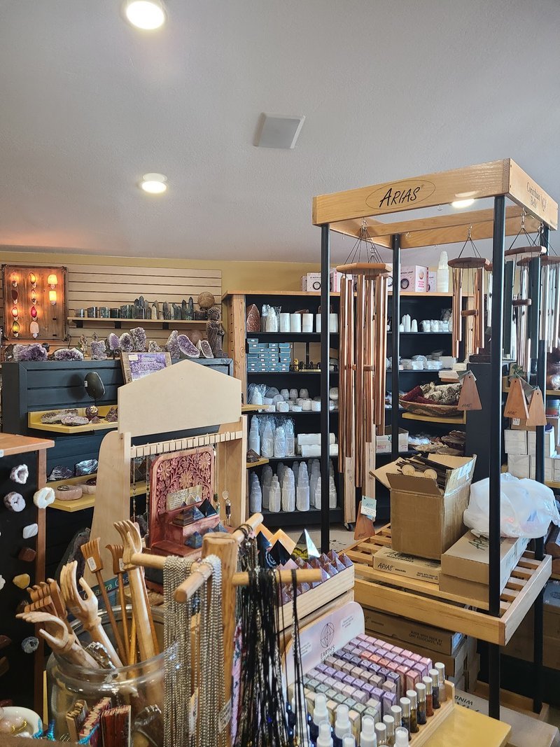 Retail display with tumbled stones, raw crystals, and polished specimens