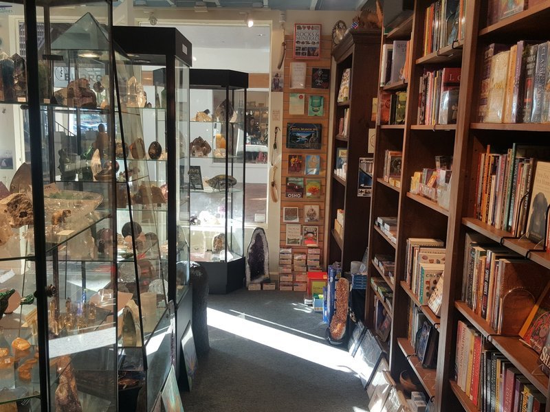 Crystal and mineral specimens including quartz, amethyst, and calcite varieties