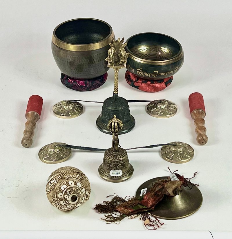 Display of polished crystal specimens, geodes, and mineral towers