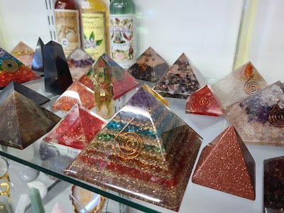 Selection of healing crystals, tumbled stones, and decorative mineral pieces