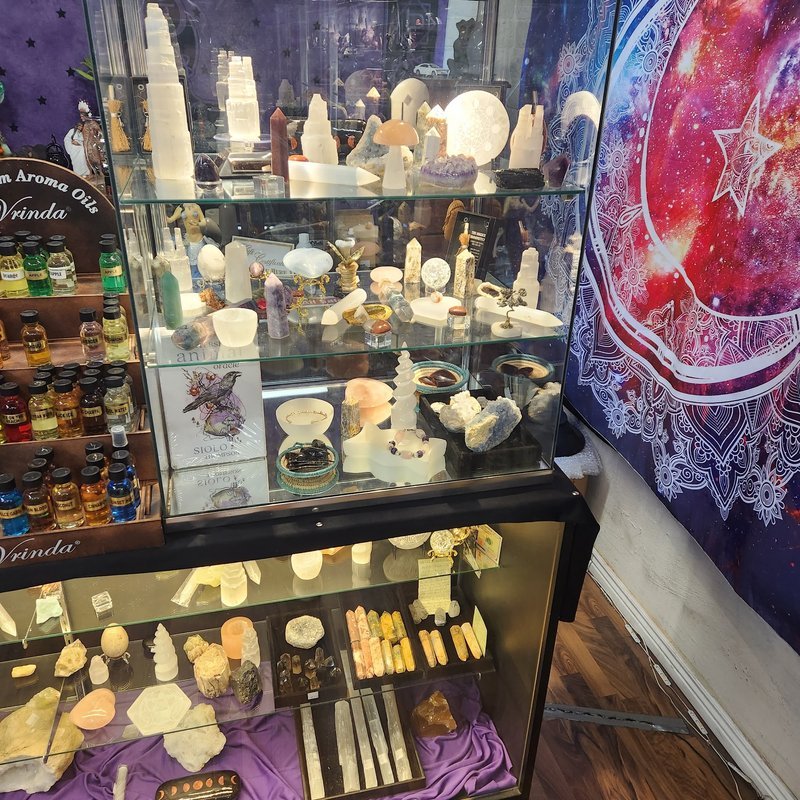 Crystal and mineral specimens including quartz, amethyst, and calcite varieties