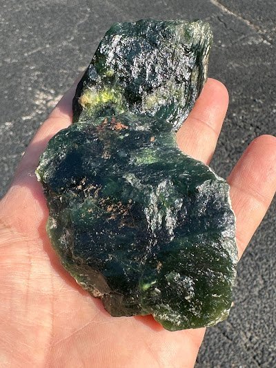 Retail display with tumbled stones, raw crystals, and polished specimens