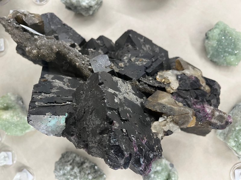 Organized crystal display with labeled stones and healing minerals