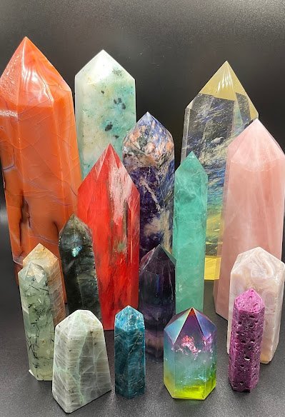 Assortment of crystal towers, spheres, clusters, and polished gemstones