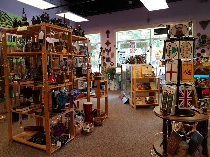 Shop interior featuring gemstones, healing crystals, and spiritual products