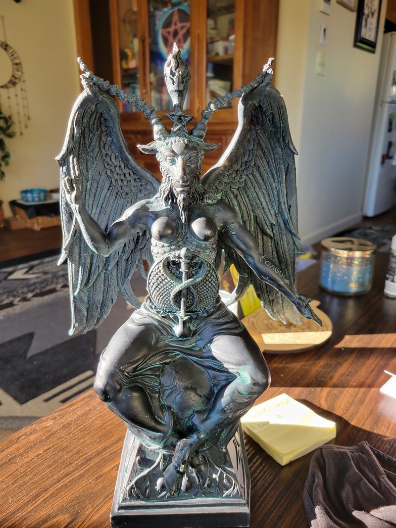 Organized crystal display with labeled stones and healing minerals