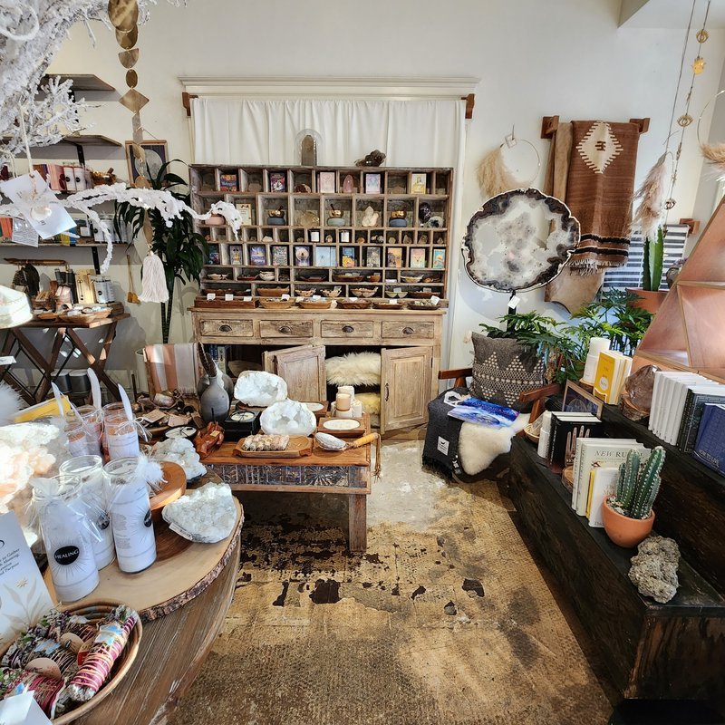 Retail display with tumbled stones, raw crystals, and polished specimens