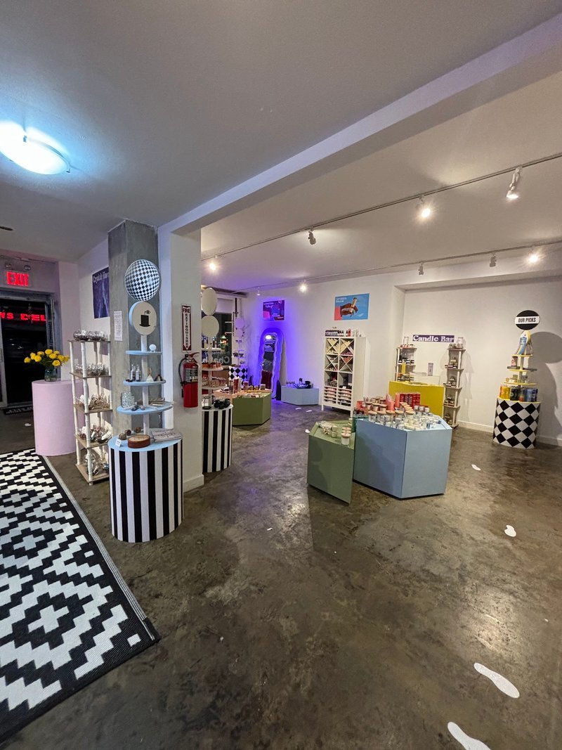 Shop interior featuring gemstones, healing crystals, and spiritual products