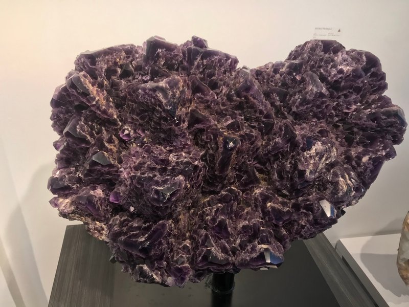 Selection of healing crystals, tumbled stones, and decorative mineral pieces