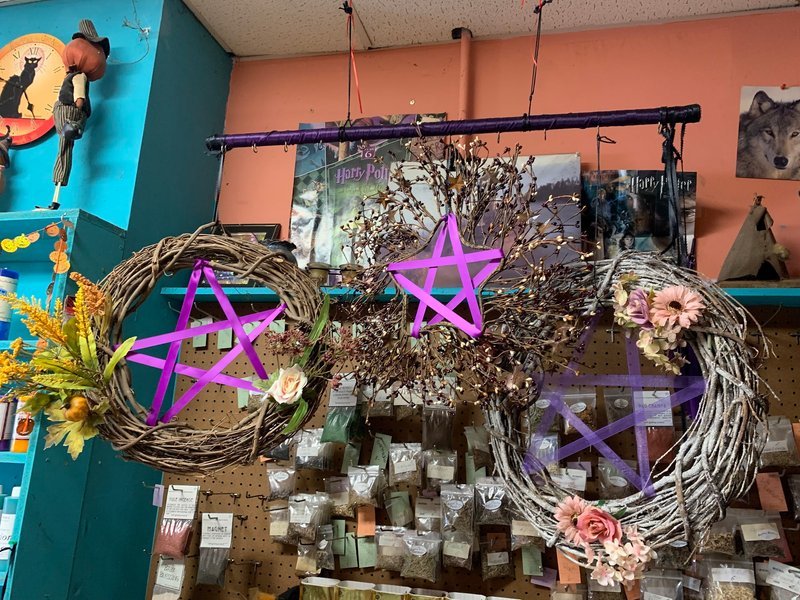 Store interior displaying crystals, minerals, and metaphysical supplies