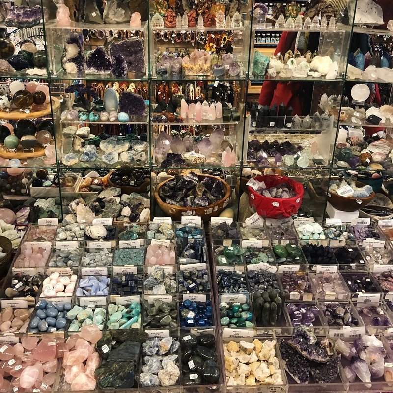 Store interior displaying crystals, minerals, and metaphysical supplies