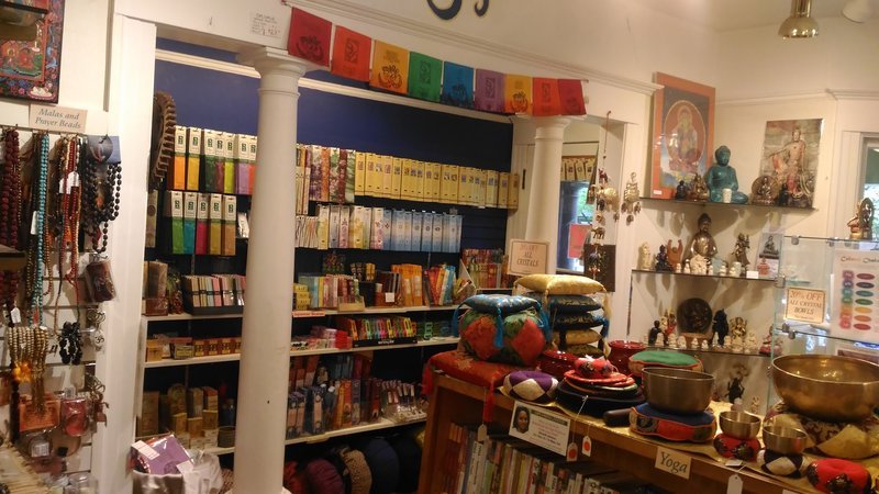 Retail display with tumbled stones, raw crystals, and polished specimens