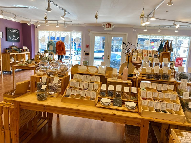 Retail display with tumbled stones, raw crystals, and polished specimens
