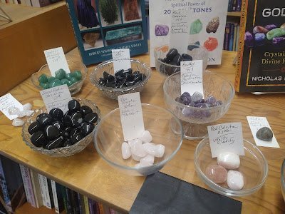 Crystal and mineral specimens including quartz, amethyst, and calcite varieties