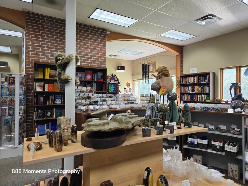 Retail display with tumbled stones, raw crystals, and polished specimens