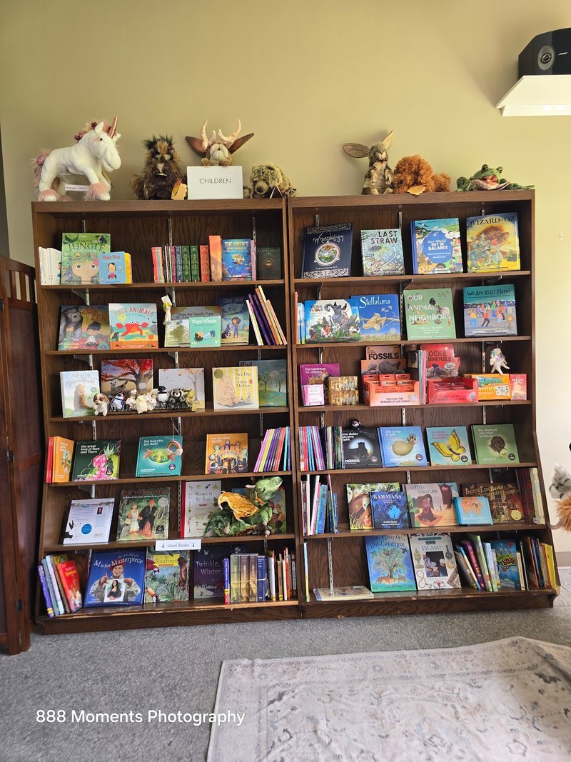 Display of polished crystal specimens, geodes, and mineral towers