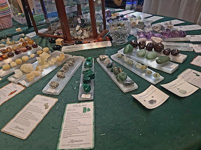 Selection of healing crystals, tumbled stones, and decorative mineral pieces