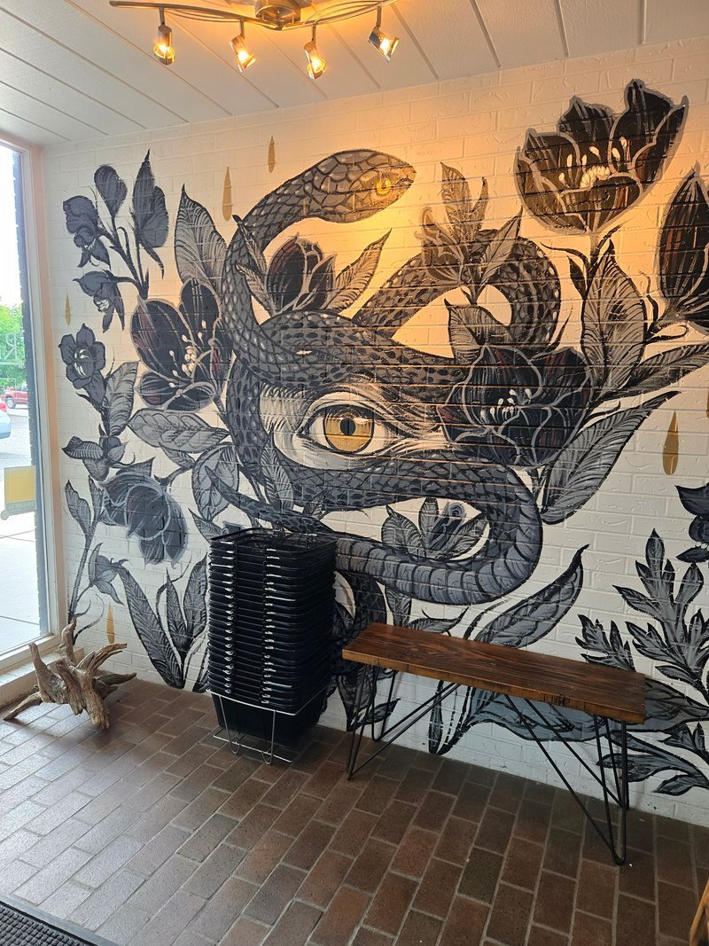 Retail display with tumbled stones, raw crystals, and polished specimens