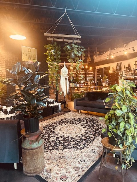 Organized crystal display with labeled stones and healing minerals