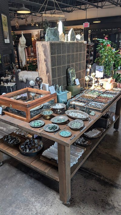 Assortment of crystal towers, spheres, clusters, and polished gemstones