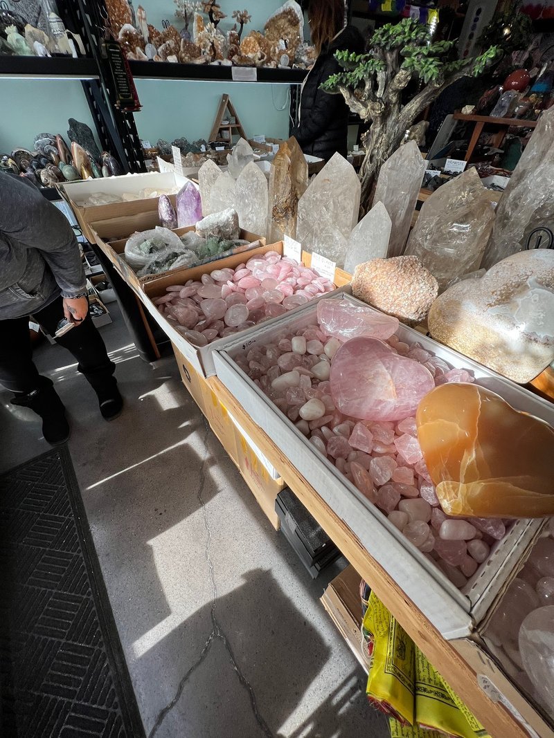 Crystal and mineral specimens including quartz, amethyst, and calcite varieties