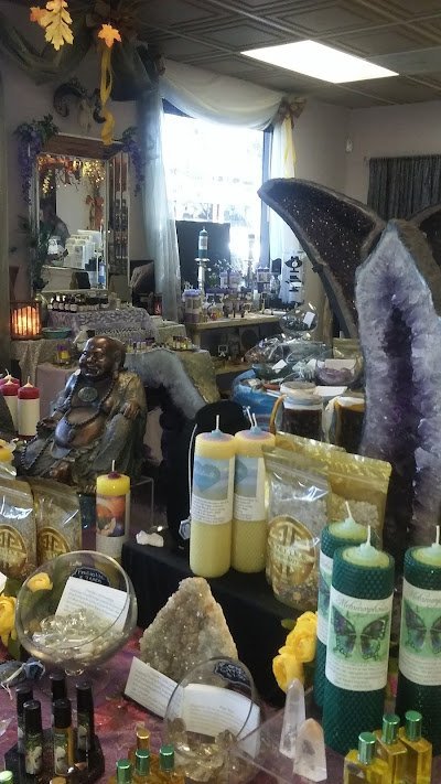 Retail shelving with organized crystals, stones, and spiritual products