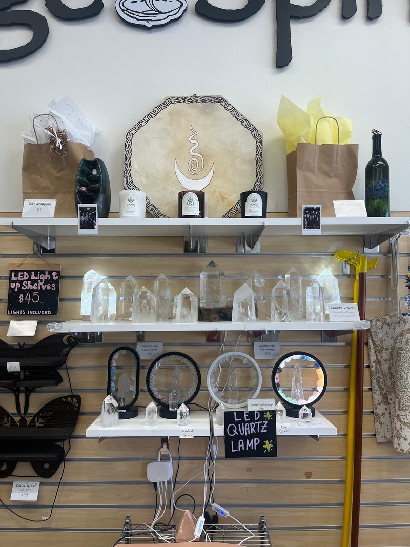 Selection of healing crystals, tumbled stones, and decorative mineral pieces