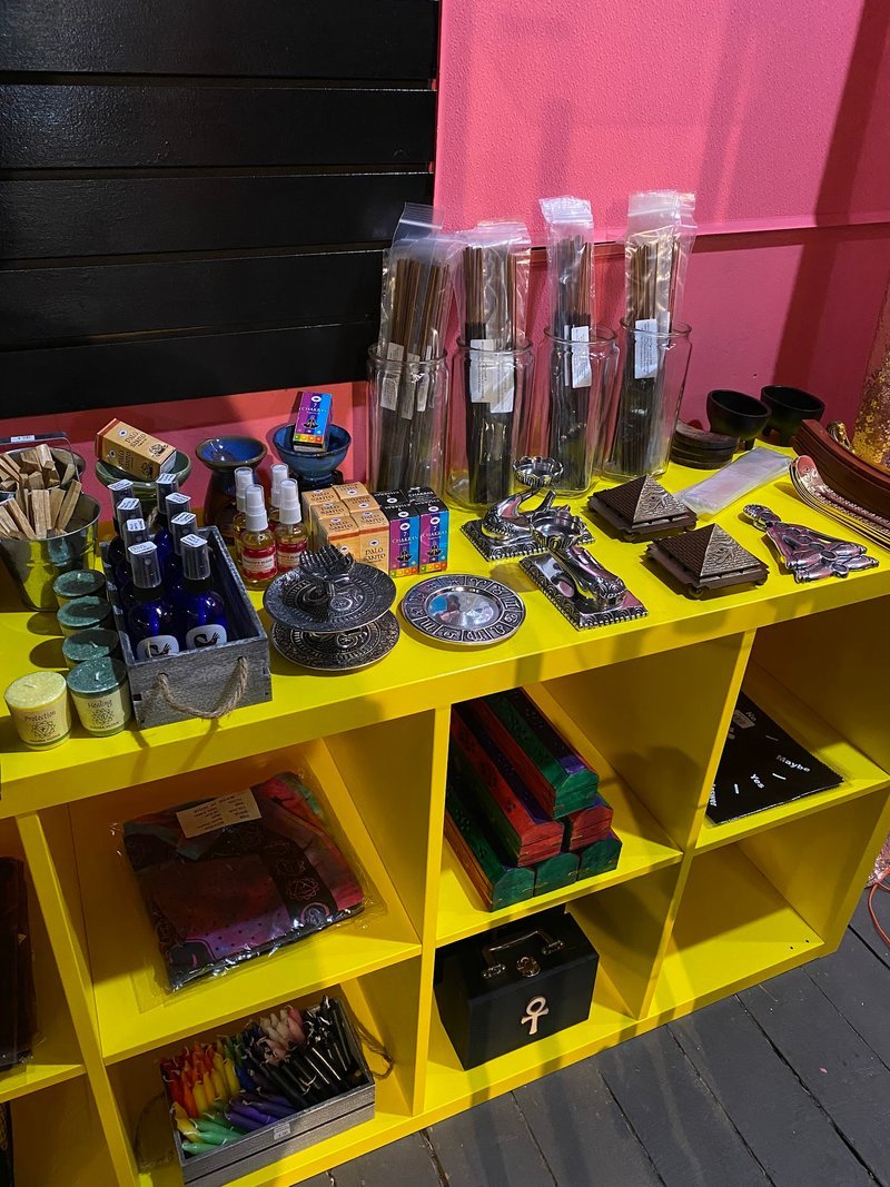 Collection of tumbled stones, raw minerals, and crystal clusters