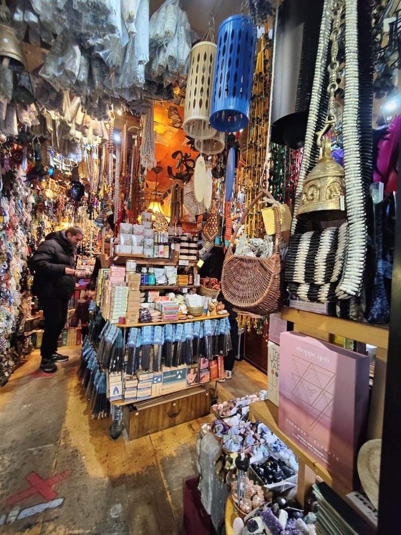 Retail display with tumbled stones, raw crystals, and polished specimens